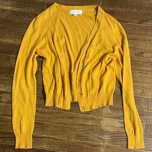 yellow cardigan
